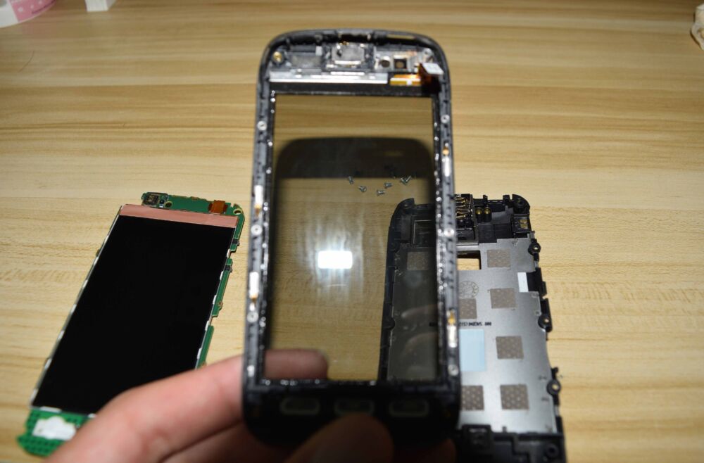 拆解2011年Symbian Belle入门机诺基亚603，当年加钱能上小米1了
