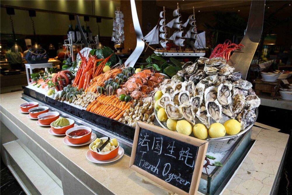 位于~广州喜来登酒店海鲜自助交通方便399元享2大2小尽享环球美食